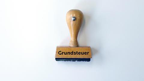 Stempel mit Schriftzug Grundsteuer